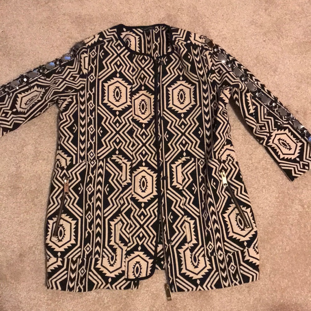 Light weight black and cream collarless coat